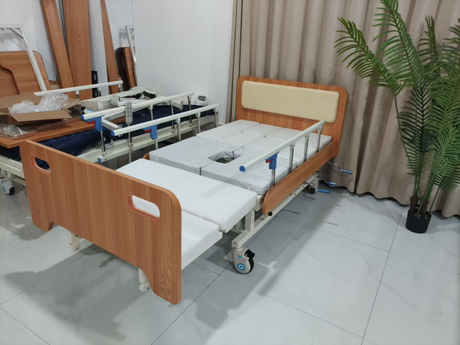 Tempat tidur keperawatan pagar pembatas kayu2.jpg